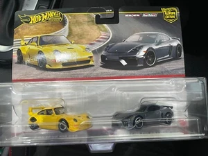 HOTWHEELS 2 PACK  PORSCHE 993 GT2 & PORSCHE 778 CAYMAN GT4 - BRAND NEW - Foto 1 di 1
