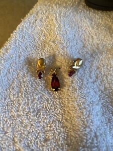 raspberry Rodalite pendant and matching stud earrings and 14 karat gold