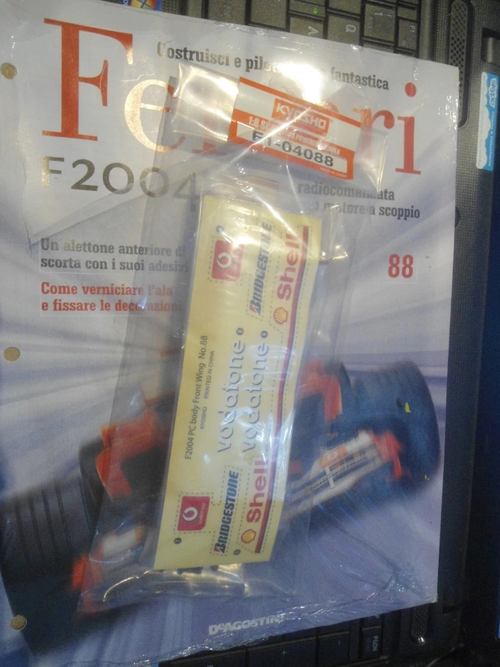 FERRARI F2004 KYOSHO  1/8 - DE AGOSTINI - RICAMBI RC - SCEGLI USCITE + FASCICOLO - Immagine 1 di 1