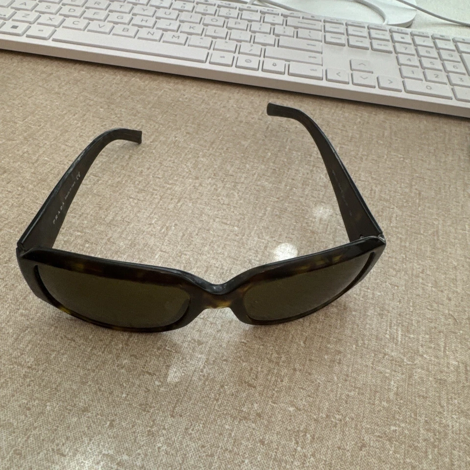 Monturas de gafas de sol Prada para piezas lentes no incluidas SPR 12H para mujer Foto 1 de 4