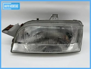 Original Fiat Punto I Headlamp Left 46481414 / 39770381 - Picture 1 of 10