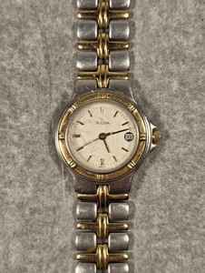 Reloj Bulova Mujer Vintage 25mm Plata Oro Dos Tonos Fecha Batería Nueva 7.5" - Imagen 1 de 9
