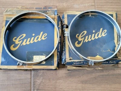 NOS 55 56 57 CHEVROLET PASSENGER / CORVETTE HEADLIGHT RINGS GM 5946431  - Image 1 of 2