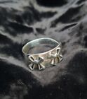Handmade Sterling Silver Ring with bows. Size U
