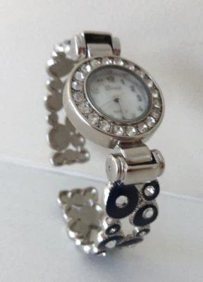 GENEVA WRIST WATCH WOMEN SILVER TONE RHINESTONE BEZEL BLACK BUBBLES CIRCLES CUFF - image 1 of 4