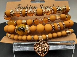 Armband, apricot und hellbraun Stretcharmband mit Herz Lebensbaum Anhänger - Bild 1 von 2
