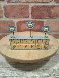 2012 Blossom Bucket Suzi Skoglund Nurses Care Shelf Sitter Flowers And Bandaids - Picture 1 of 6