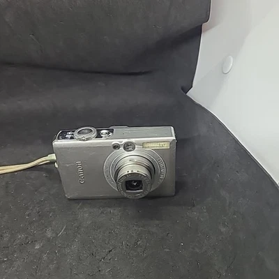 Cámara digital Canon PowerShot Digital ELPH SD600 6,0 MP funcionando - sin cargador Foto 1 de 4