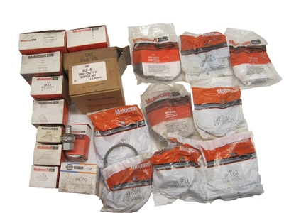 Assorted Lot Ford Motorcraft plug wires distributor caps, stators starter drives - Image 1 of 4