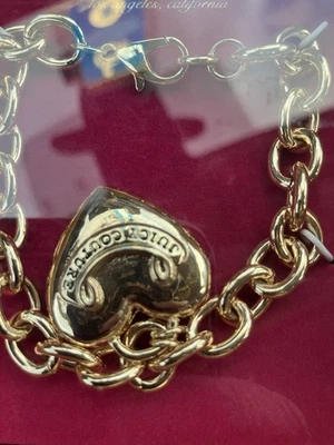 PULSERA JUICY COUTURE Cadena Tono Dorado Con Corazón Hinchado Dije Medias Relleno Foto 1 de 4