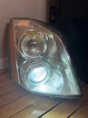 06-11 Faro delantero derecho Cadillac DTS - OEM ✅PROBADO✅ 2756 Foto 1 de 4