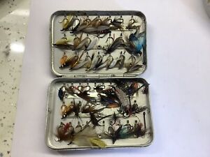hardy fly fishing tin with flies