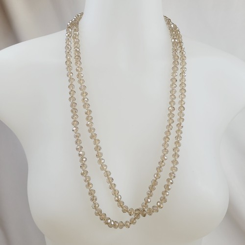 VETEMENTS Collana bigiotteria moda perline cristalli champagne sfaccettati 60" Infinity Opera