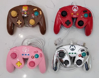 Almohadilla de lucha con cable para Wii U + Wii - JUEGO DE CUATRO: MARIO, MELOCOTÓN, METAL MARIO, DK Foto 1 de 4