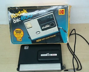 Cámara de disco vintage Kodak 4100 con caja, correa y 1 disco de película abierto/usado sin probar - Imagen 1 de 5