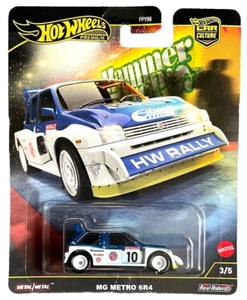 Hot Wheels MG Metro 6R4 Hammer Drop 3/5 1:64 modellino auto bambini giocattolo rally - Foto 1 di 14
