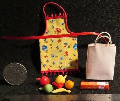 Delantal amarillo saco de cocina envoltura de plástico mezcla de frutas 1:12 miniatura creativa 6365 Foto 1 de 3