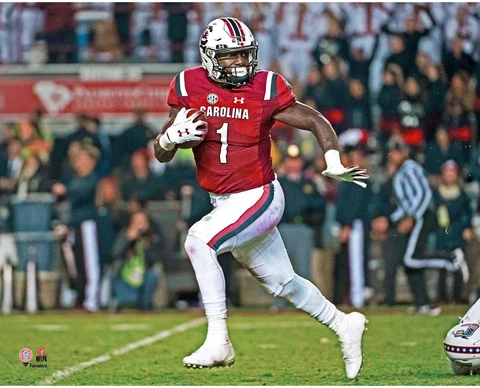 Deebo Samuel South Carolina Gamecocks Unsigned Red Jersey Running Photograph Cover