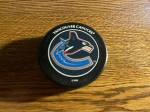 VANCOUVER CANUCKS OFFICIAL NHL HOCKEY PUCK SLOVAKIA GREAT FOR AUTOS - Picture 1 of 2