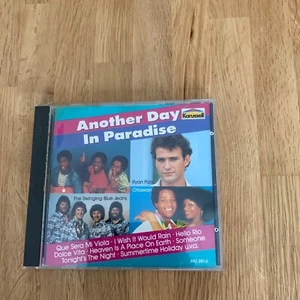ANOTHER DAY IN PARADISE / CD\ OTTAWAN, GIBSON BROTHER, RYAN PARIS .... - Bild 1 von 3