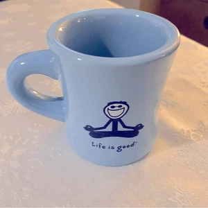 Life Is Good hellblaue Tasse mit meditierender Figur ohne Chups - Bild 1 von 6