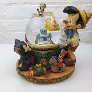 Raro mappamondo musicale di neve Disney Store Pinocchio "Toyland" - vintage da collezione - Foto 1 di 16