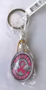 LLAVERO OVALADO ROSA PARA CONCIENCIAR SOBRE EL CÁNCER DE MAMA ""GUERRERO DEL CÁNCER LADO DBLE - Imagen 1 de 1