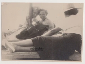 A Happy Couple Lovers and the Back of Young Woman in the Frame Unusual Snapshot - Picture 1 of 7