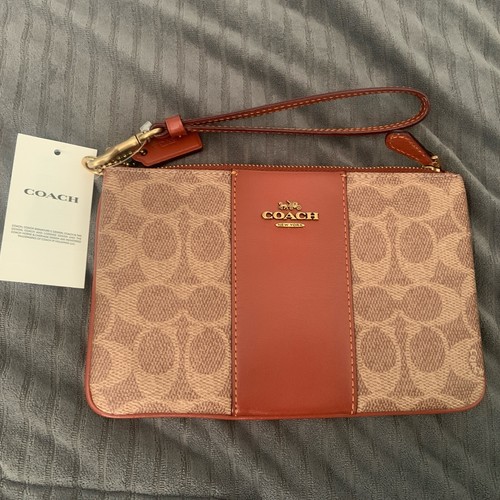 Braccialetto con zip Coach rivestito in tela marrone ruggine nuovo con etichetta