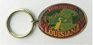 LLAVERO VINTAGE DE LATÓN AMINCO - PAÍS PANTANO DE BAYOU - PELÍCANO Y PANTANO DE LUISIANA - Imagen 1 de 2
