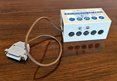 TRILOGIC MIDI INTERFACE FOR COMMODORE AMIGA 500 600 1000 1200 2000 3000 4000 HD - Immagine 1 di 4