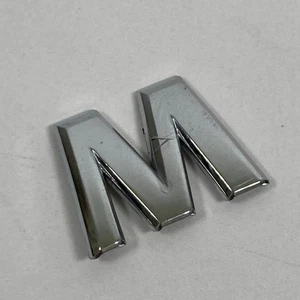 2004-2008 Nissan Maxima 2.5 SE Emblem Logo Letter 'M' Rear Tailgate Trunk Chrome - Picture 1 of 9
