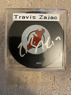 Disco de hockey firmado por Travis Zajac New Jersey Devils Foto 1 de 2