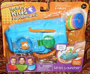 Reloj de Bolsillo Hobby Niños Aventuras Lanzador de Muñeca TOTALMENTE NUEVO en Caja Juguete - Imagen 1 de 3
