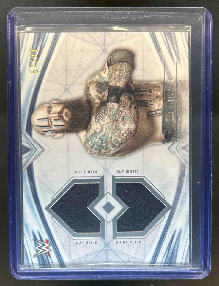 2020 Topps WWE Undisputed Erik Dual Jersey #/99 - Image 1 of 2