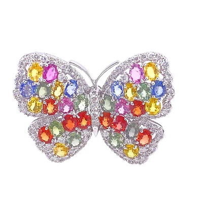 Pin de oro blanco de 18 quilates con zafiros y diamantes mariposa Foto 1 de 4