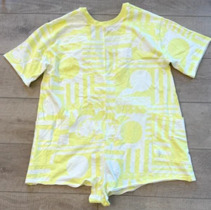 NEW FREE PEOPLE FP MOVEMENT YELLOW PRINTED HOT SHOT TEE ONE PIECE ROMPER SZ XS - Picture 1 of 8