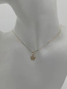 COLLANA DA DONNA CON CIONDOLO STELLA ORO GIALLO 18KT E ZIRCONI 1,6 gr. (6976) - Foto 1 di 8