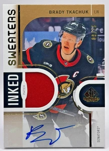 BRADY TKACHUK 2024-25 SP GAME USED IS-BT INKED SWEATERS PATCH AUTO /15 - Picture 1 of 2