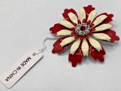 Prendedor de flores rojo y blanco gemado Foto 1 de 3