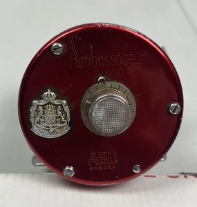 Vintage Abu Garcia Red Ambassadeur 5000 Baitcast Fishing Reel Works Great - Picture 1 of 8