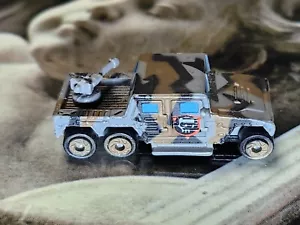 Micro Máquina TRAXCON RAIDER Militar Gris Camuflaje - Imagen 1 de 4