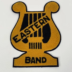 Parche Letterman Música Fieltro Vintage Banda ORIENTAL Negro Dorado - Imagen 1 de 6
