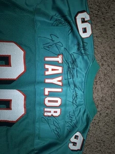 Jason Taylor Signed Miami Dolphins Jersey along with 5 other Dolphins - Picture 1 of 5