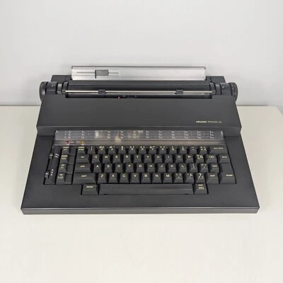 Olivetti Praxis 35 便携式电动打字机 带手提箱 带墨水安装 — 第 1/4 张图片
