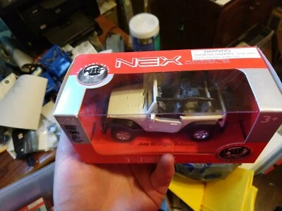NEX Models Die Cast Metal to Scale by WELLY  Jeep JK Wrangler Rubicon  42371C-CW - Image 1 of 4