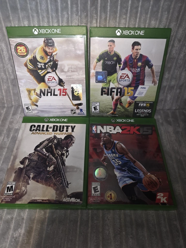 Lote de 4 Videojuegos XBOX ONE Lote. NHL15. Call of Duty. FIFA15. NBA2K15. Foto 1 de 4