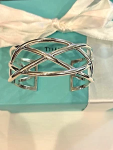 TIFFANY&CO.NY VINTAGE. KELTISCHES GEWEBTES MANSCHETTENARMBAND .925 WGT-40,5 GRMS-UUE-MLP$825. - Bild 1 von 6