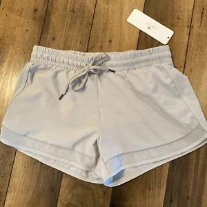 CRZ YOGA Women's Beige Loose Running Shorts w/ Pocket -2.5" Inseam (Size:L) - Picture 1 of 12