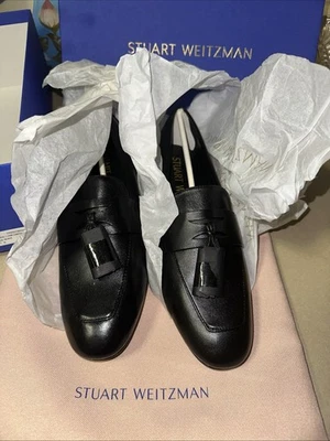 Mocasín plano Stuart Weitzman Lyon de cuero lacado negro con borlas 7 B (37,5) UE Foto 1 de 4